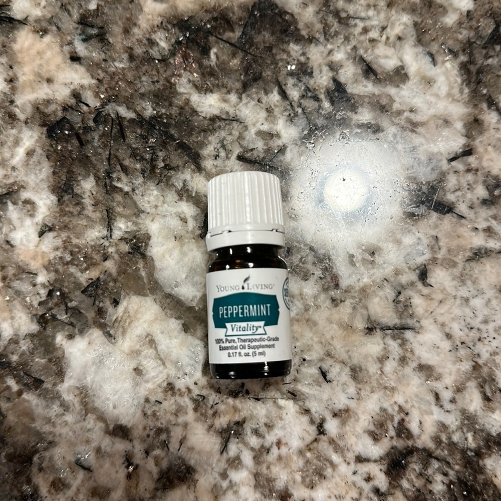 Brand new 5 ml bottle of Peppermint Vitality essential oil.